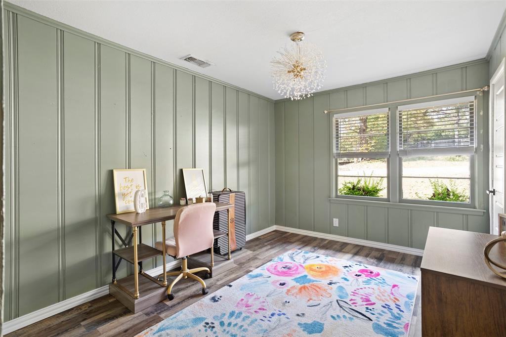 611 East Watkins Street Tyler, TX 75701 - Photo 22 of 29 a bedroom with a bed and a window