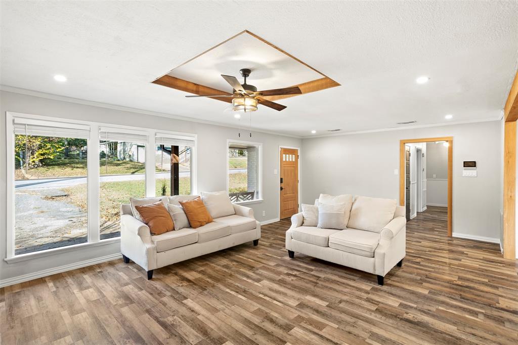 611 East Watkins Street Tyler, TX 75701 - Photo 4 of 29 a living room with furniture and a large window