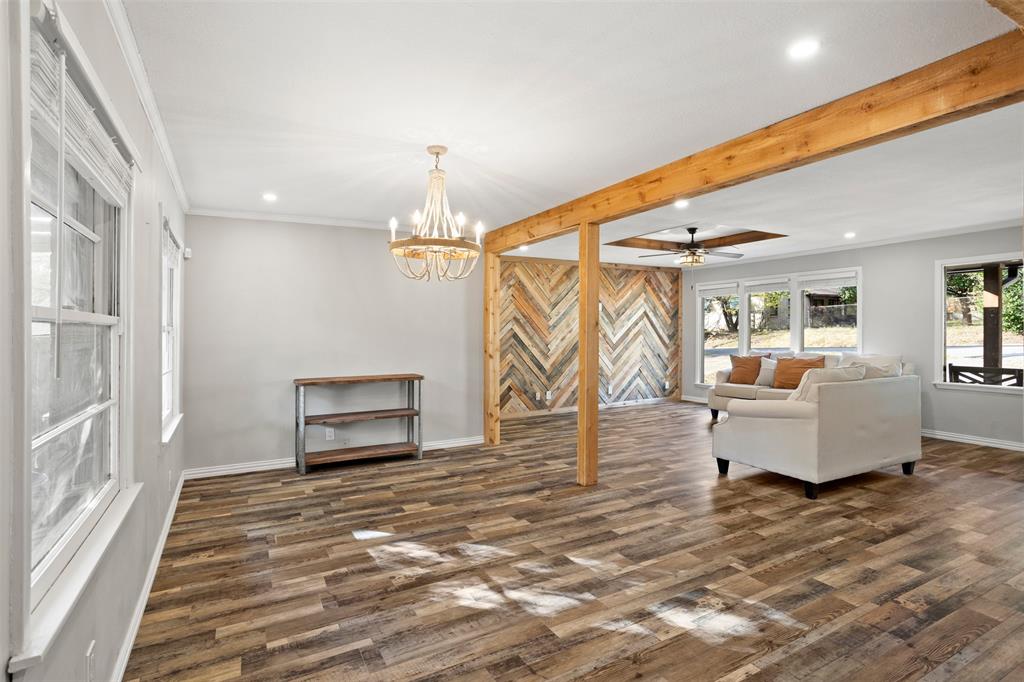 611 East Watkins Street Tyler, TX 75701 - Photo 10 of 29 a bedroom with furniture and window