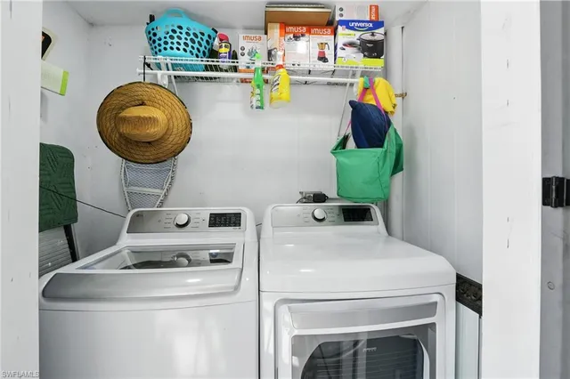 a bedroom with a bed and a cabinets