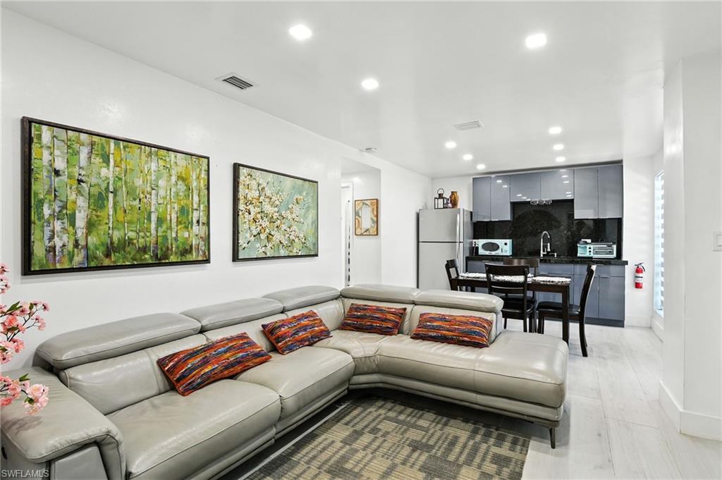 936 Panther Creek Lane Everglades City, FL 34139 - Photo 18 of 50 a living room with furniture and a flat screen tv