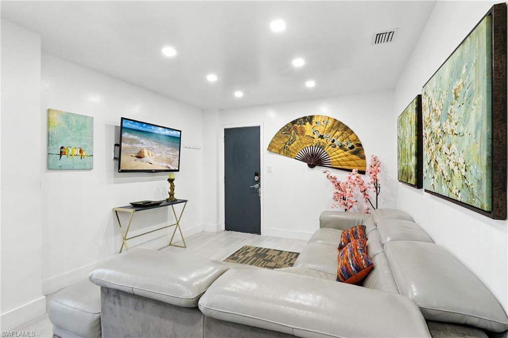 936 Panther Creek Lane Everglades City, FL 34139 - Photo 19 of 50 a bedroom with furniture and a bed