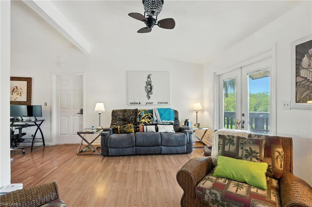 936 Panther Creek Lane Everglades City, FL 34139 - Photo 37 of 50 a living room with furniture and a wooden floor