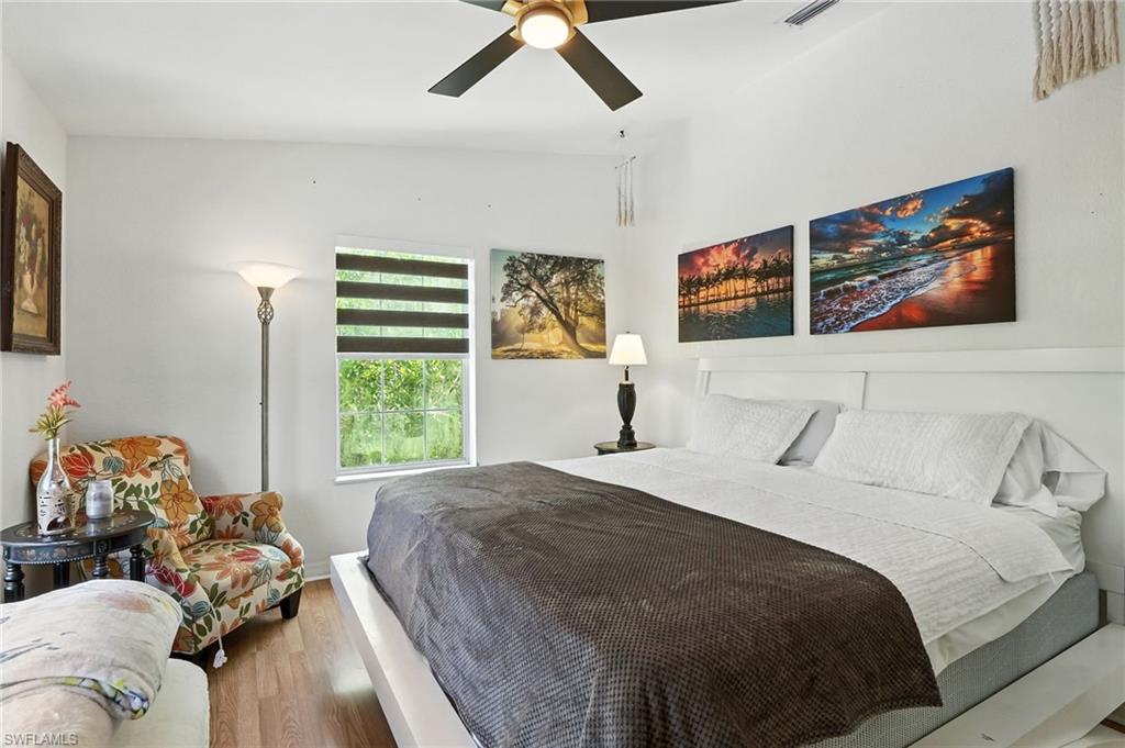 936 Panther Creek Lane Everglades City, FL 34139 - Photo 41 of 50 a bedroom with a bed and a window