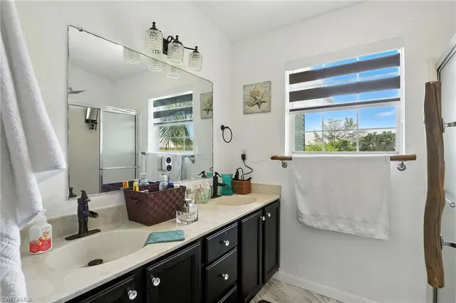 a view of a yard with chairs