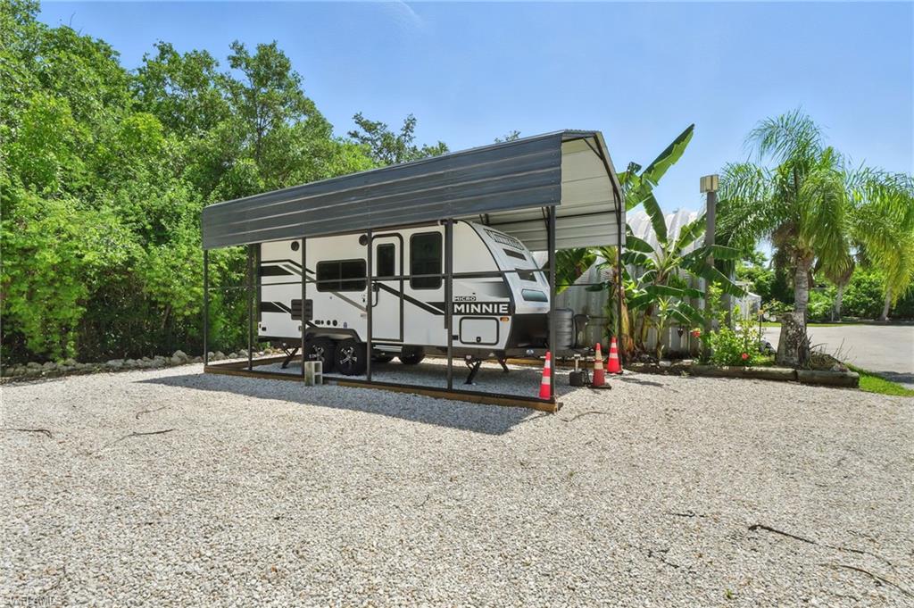 936 Panther Creek Lane Everglades City, FL 34139 - Photo 47 of 50 a view of a car park in front of a house