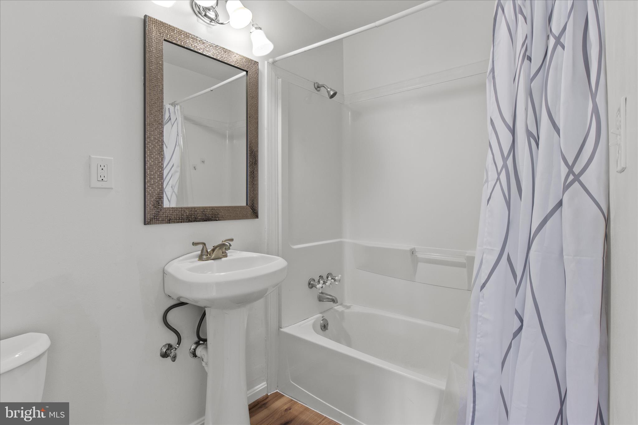 2142 Cartwright Place Reston, VA 20191 - Photo 15 of 29 a bathroom with a sink toilet and shower