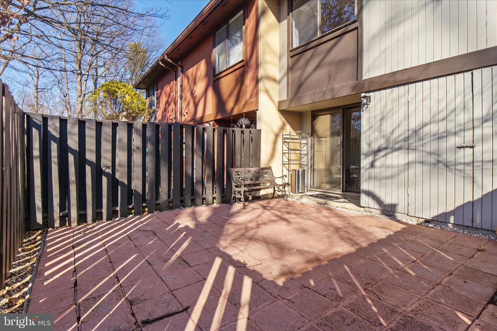 2142 Cartwright Place Reston, VA 20191 - Photo 20 of 29 a view of a house with a wooden fence