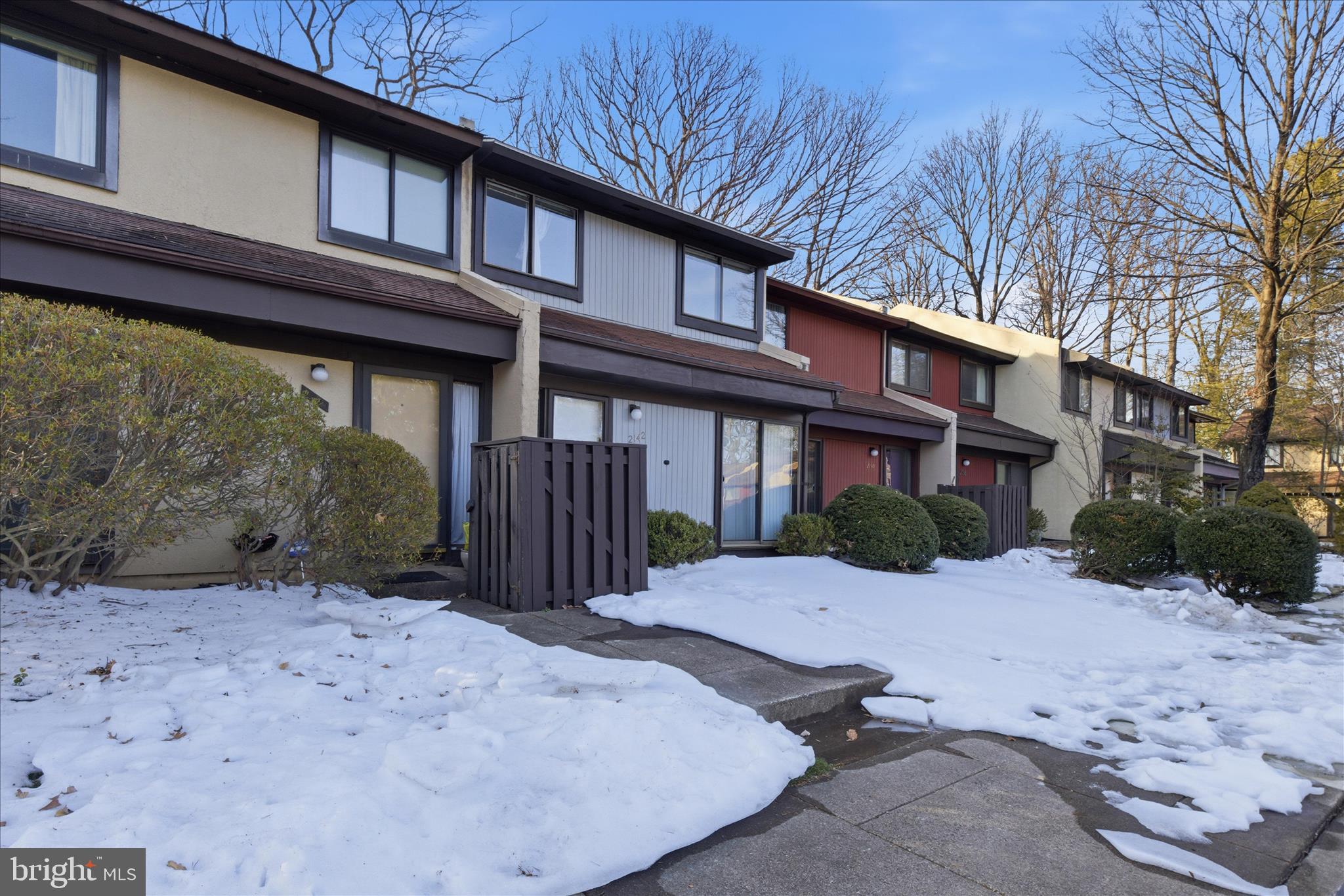 2142 Cartwright Place Reston, VA 20191 - Photo 21 of 29 a front view of a house with a yard outdoor seating and pathway