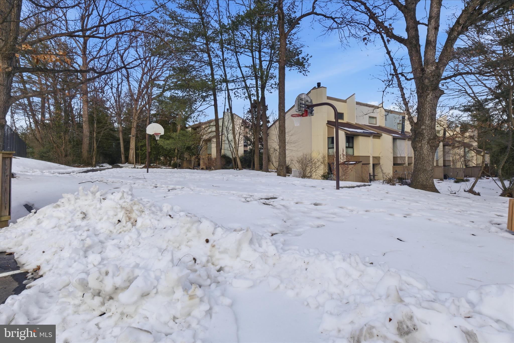 2142 Cartwright Place Reston, VA 20191 - Photo 24 of 29 a street view covered with snow
