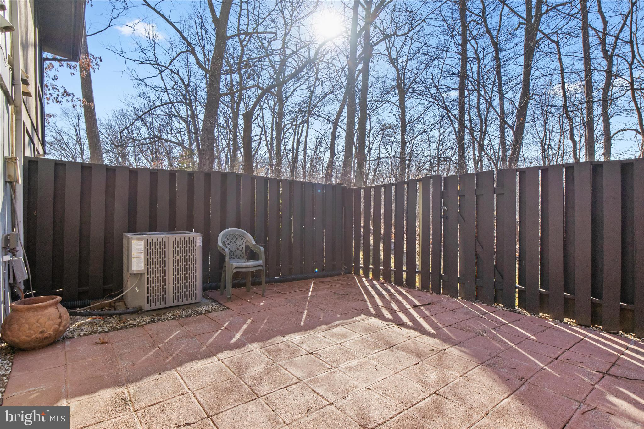 2142 Cartwright Place Reston, VA 20191 - Photo 3 of 29 a view of a chair and fire pit in the backyard