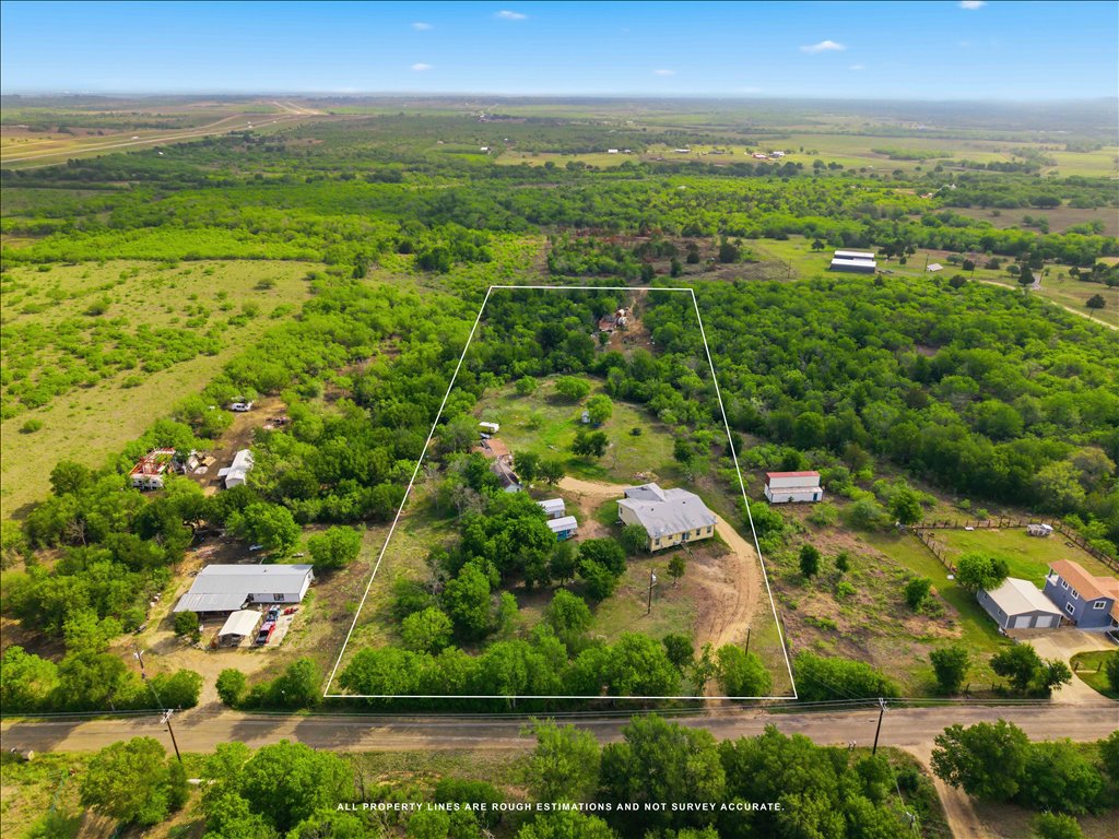 780 Spoke Hollow Road Lockhart, TX 78644 - Photo 2 of 8 a view of city and ocean