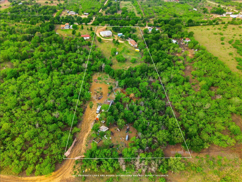 780 Spoke Hollow Road Lockhart, TX 78644 - Photo 7 of 8 a view of a garden