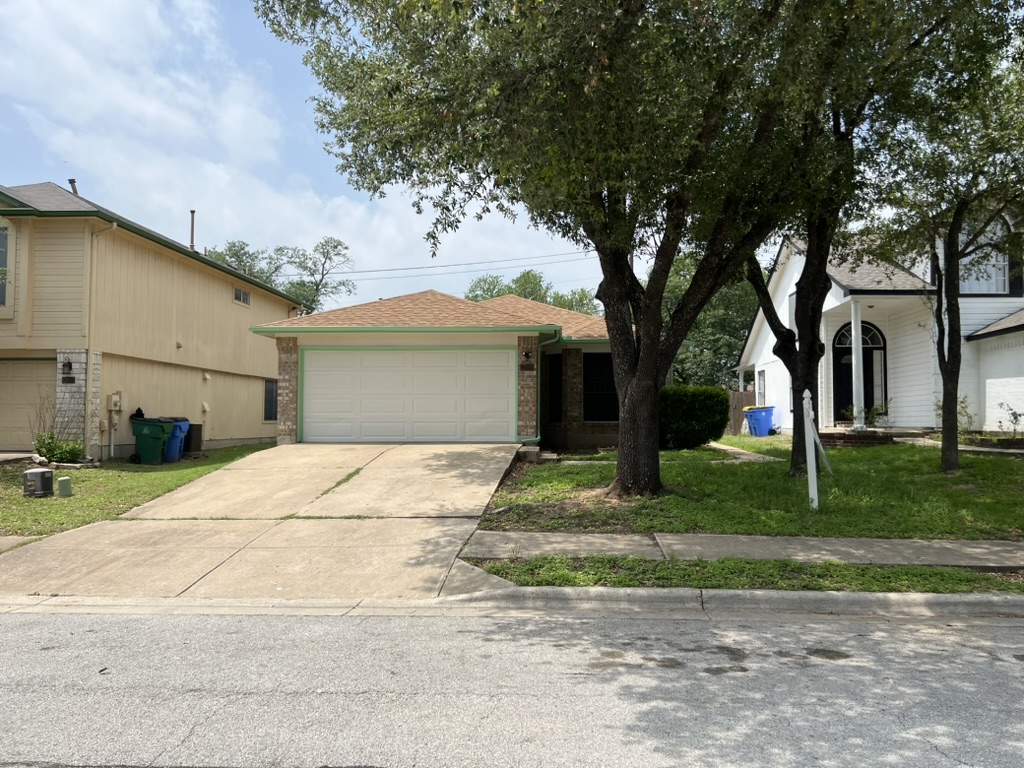 17843 Loch Linnhe Loop Pflugerville, TX 78660 - Photo 1 of 23 a house with a tree in front of it