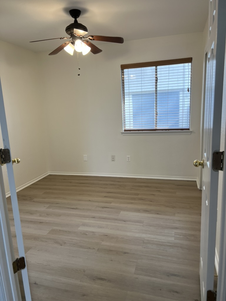 17843 Loch Linnhe Loop Pflugerville, TX 78660 - Photo 17 of 23 a view of an empty room with a window
