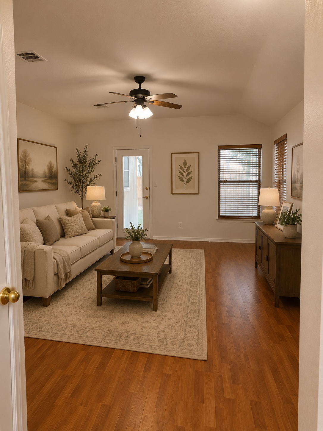 17843 Loch Linnhe Loop Pflugerville, TX 78660 - Photo 7 of 23 a living room with furniture and a wooden floor