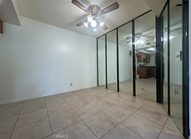 a view of an empty room with a bathroom
