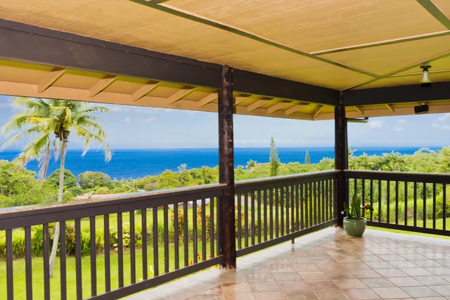 a view of a street from a balcony