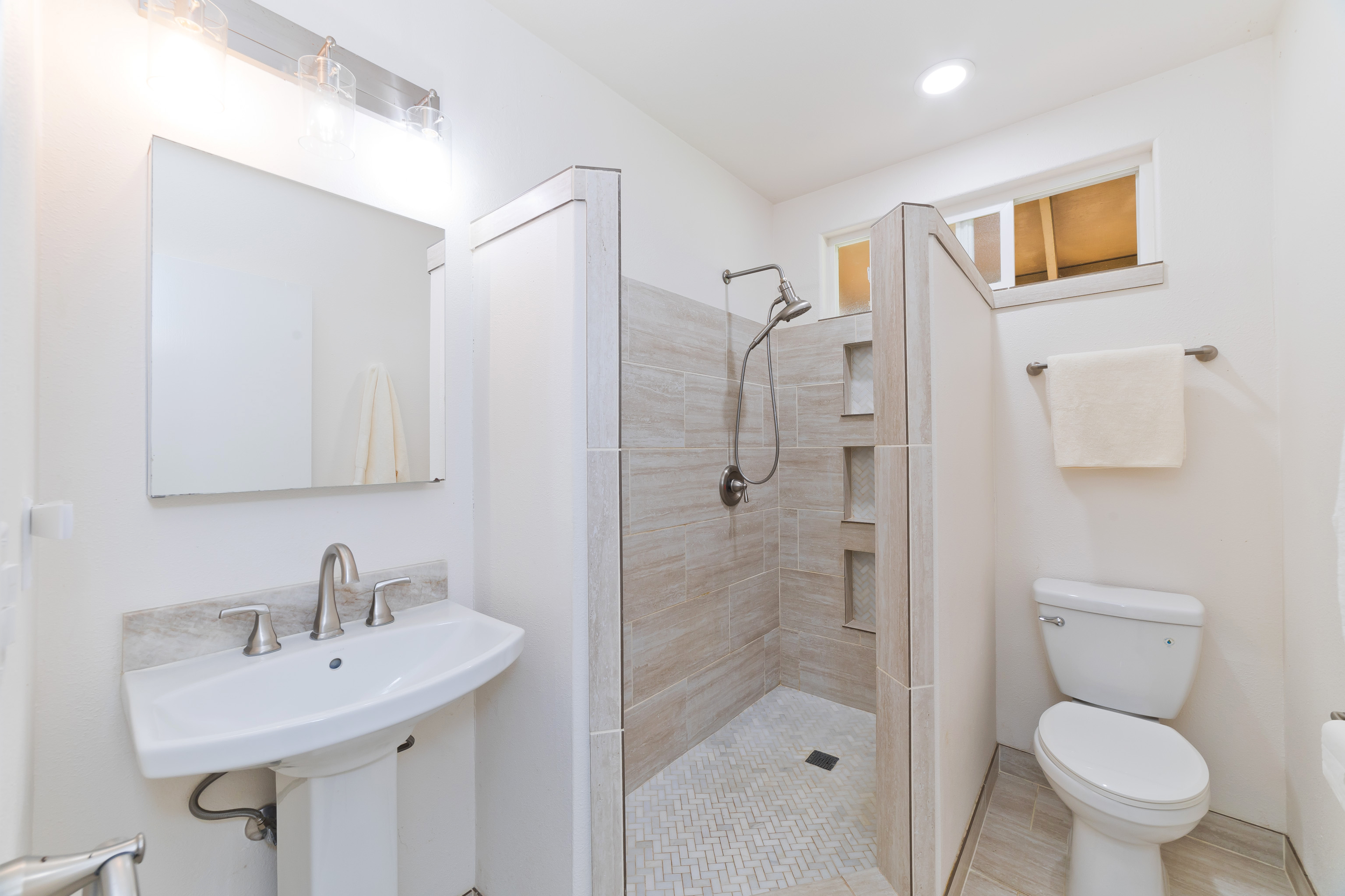 32-56 Piha Kahuku Road Ninole, HI 96773 - Photo 23 of 26 a bathroom with a sink toilet and shower