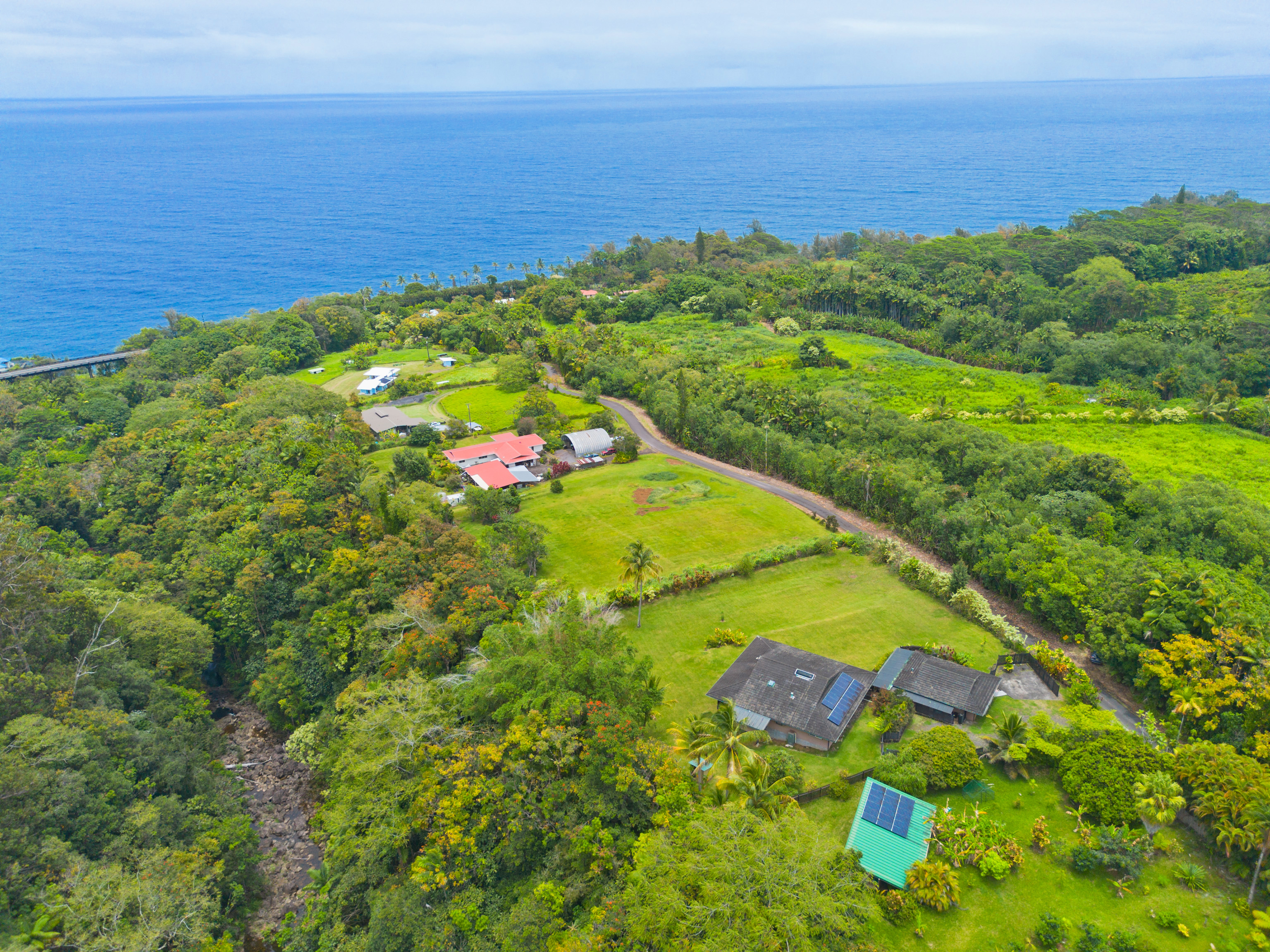 32-56 Piha Kahuku Road Ninole, HI 96773 - Photo 25 of 26 a view of a lake with a beach