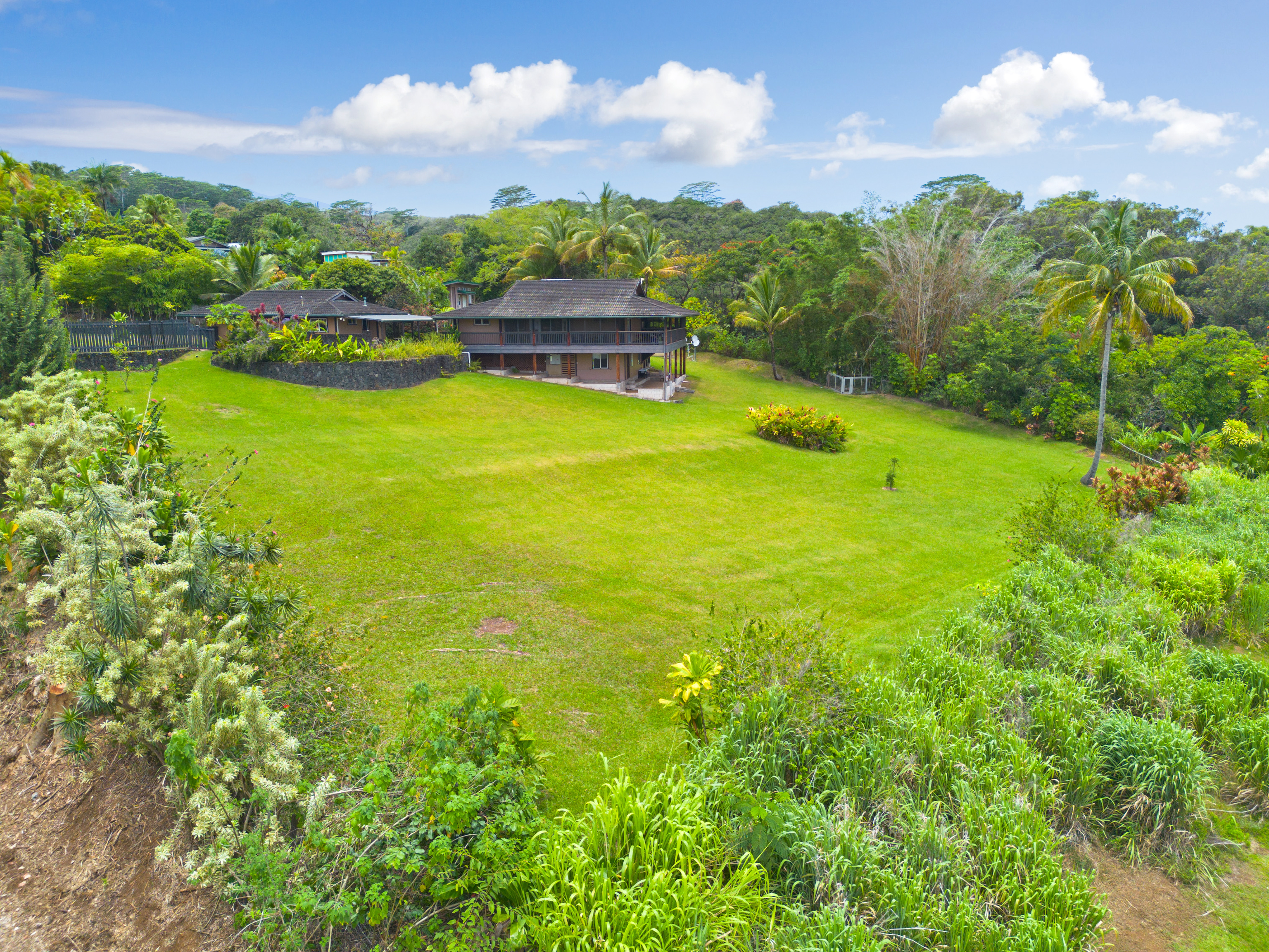 32-56 Piha Kahuku Road Ninole, HI 96773 - Photo 26 of 26 a view of a lake with houses in the back