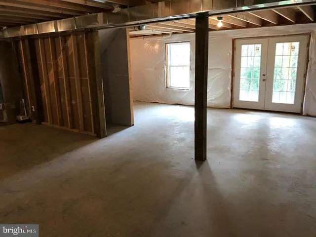 a view of a room with windows