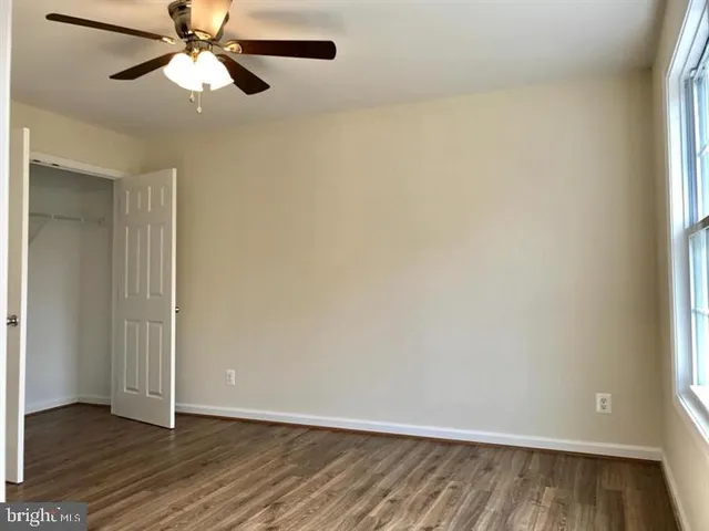 a kitchen with stainless steel appliances granite countertop a stove and a refrigerator