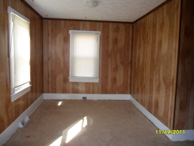 59 Valley Church Road Weyers Cave, VA 24486 - Photo 3 of 8 a view of an empty room with a window