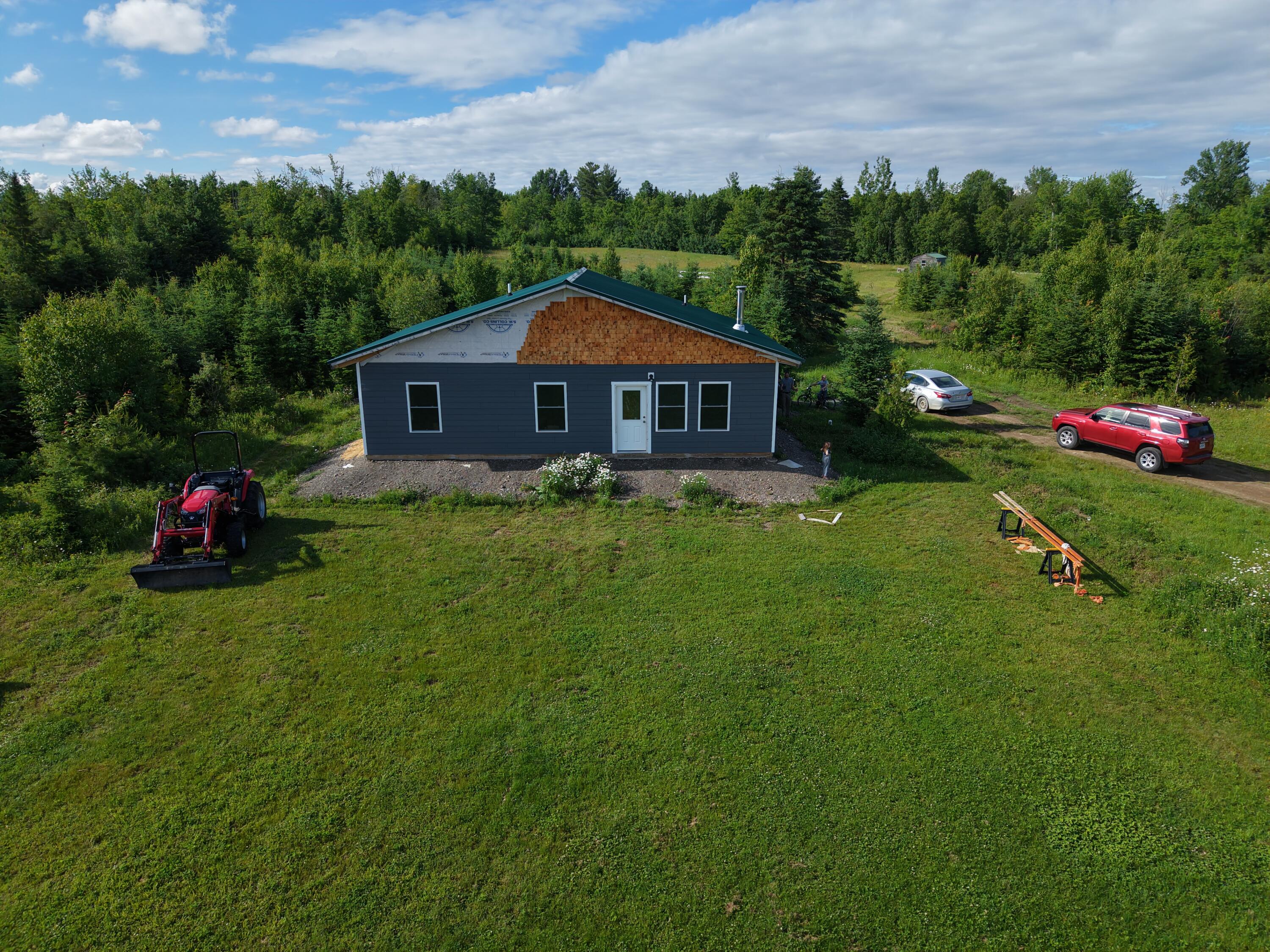 180 Moose Brook Road Ludlow, ME 04730 - Photo 2 of 14 DJI_20260625164939_0059_D