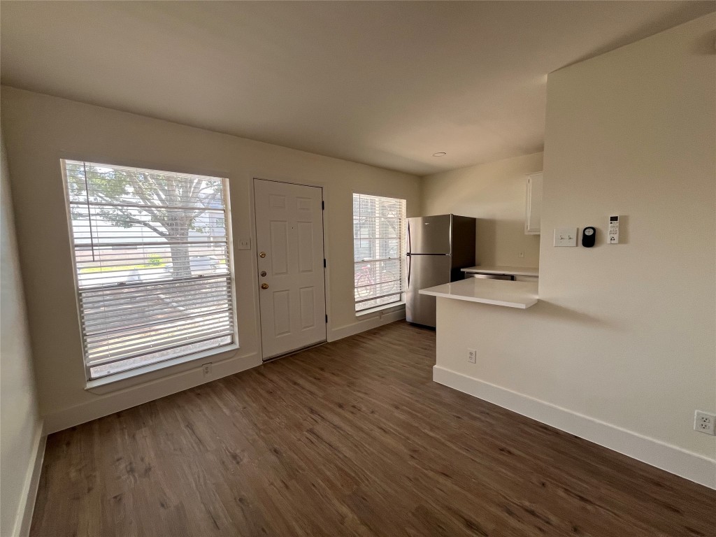 4712 Depew Avenue, Unit 106 Austin, TX 78751 - Photo 2 of 13 a view of kitchen with furniture wooden floor and window