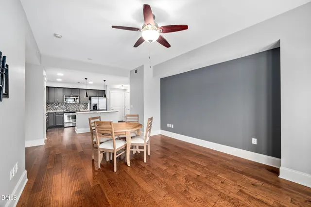 a view of a dining room with furniture