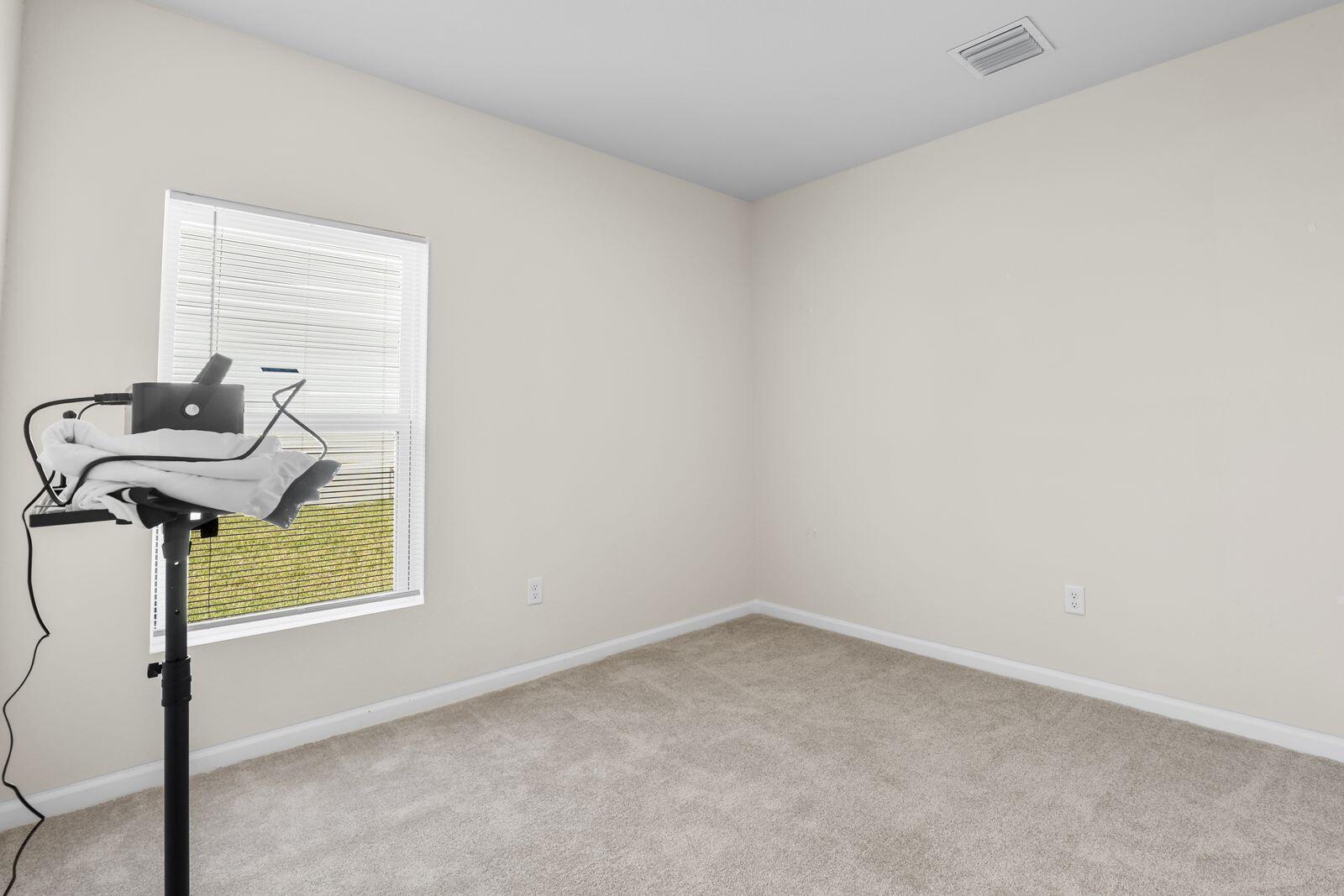 185 Dabou Loop Belle Glade, FL 33430 - Photo 15 of 25 a view of an empty room