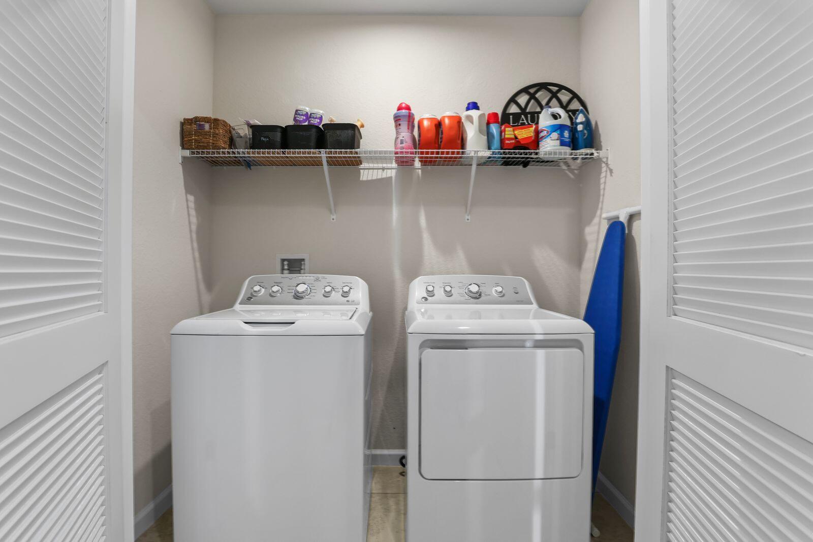 185 Dabou Loop Belle Glade, FL 33430 - Photo 20 of 25 a utility room with dryer and washer