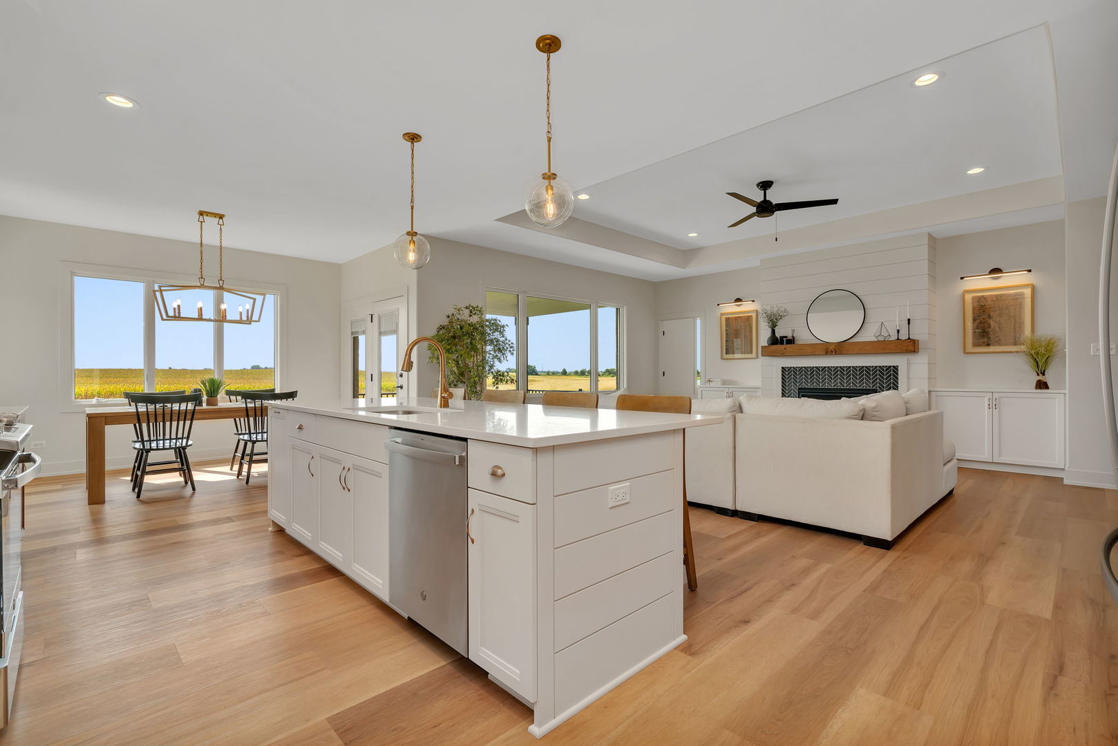 1074 Kinley Drive New Lenox, IL 60451 - Photo 14 of 37 a large kitchen with cabinets and wooden floor