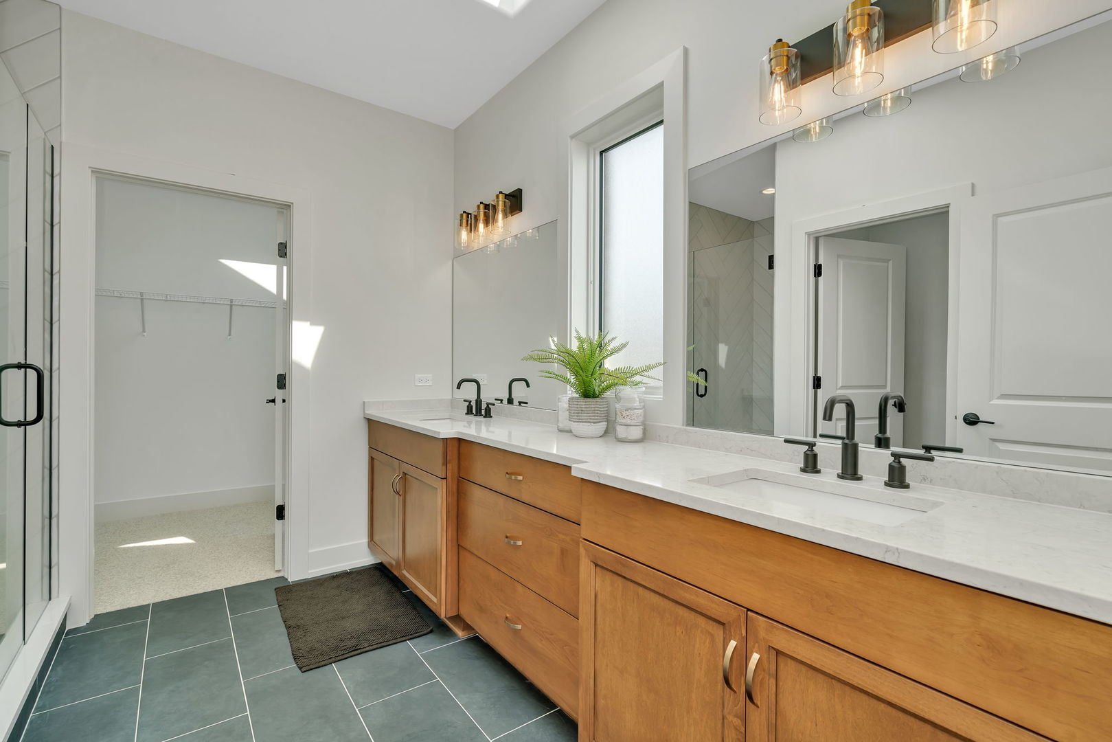 1074 Kinley Drive New Lenox, IL 60451 - Photo 20 of 37 a bathroom with a double vanity sink and mirror