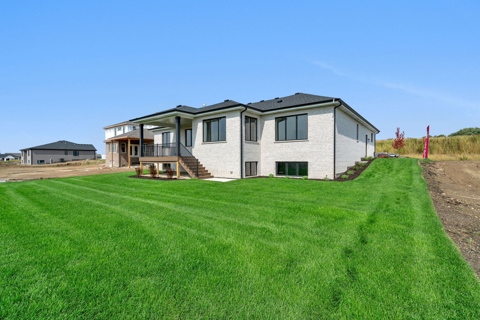 1074 Kinley Drive New Lenox, IL 60451 - Photo 30 of 37 a view of a house with a big yard with large trees
