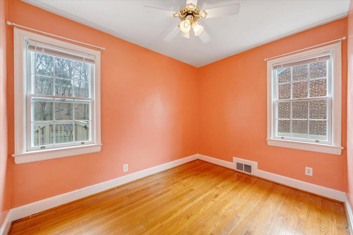 910 Brandon Avenue Southwest Roanoke, VA 24015 - Photo 20 of 50 an empty room with a window