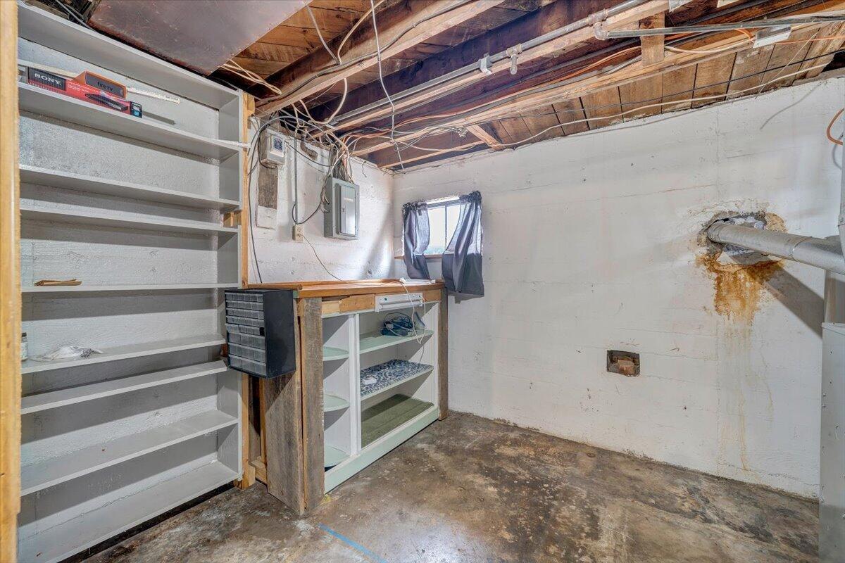 910 Brandon Avenue Southwest Roanoke, VA 24015 - Photo 34 of 50 a view of walk in closet with empty racks