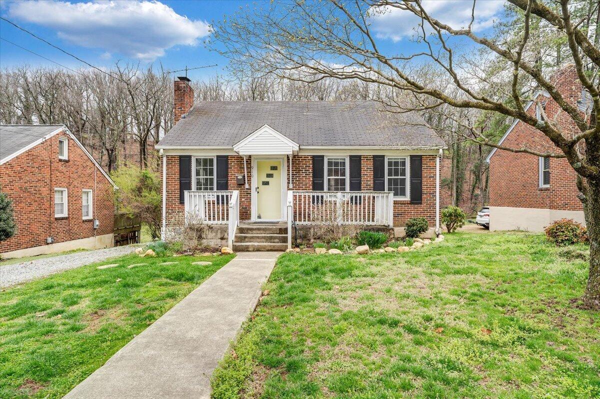 910 Brandon Avenue Southwest Roanoke, VA 24015 - Photo 48 of 50 front view of a house with a yard