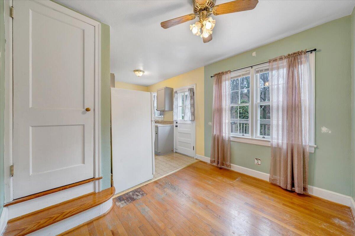 910 Brandon Avenue Southwest Roanoke, VA 24015 - Photo 8 of 50 a view of livingroom with hardwood floor and a ceiling fan
