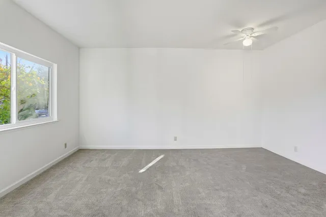 an empty room with a bathroom