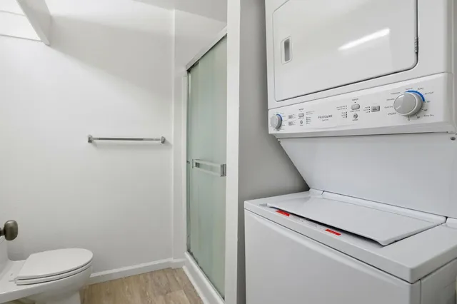 a view of a park with large trees