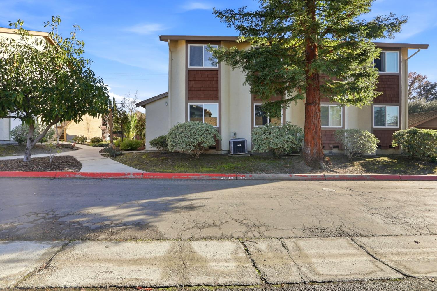152 Hackamore Lane Fremont, CA 94539 - Photo 28 of 32 a front view of a house with a yard and a garage