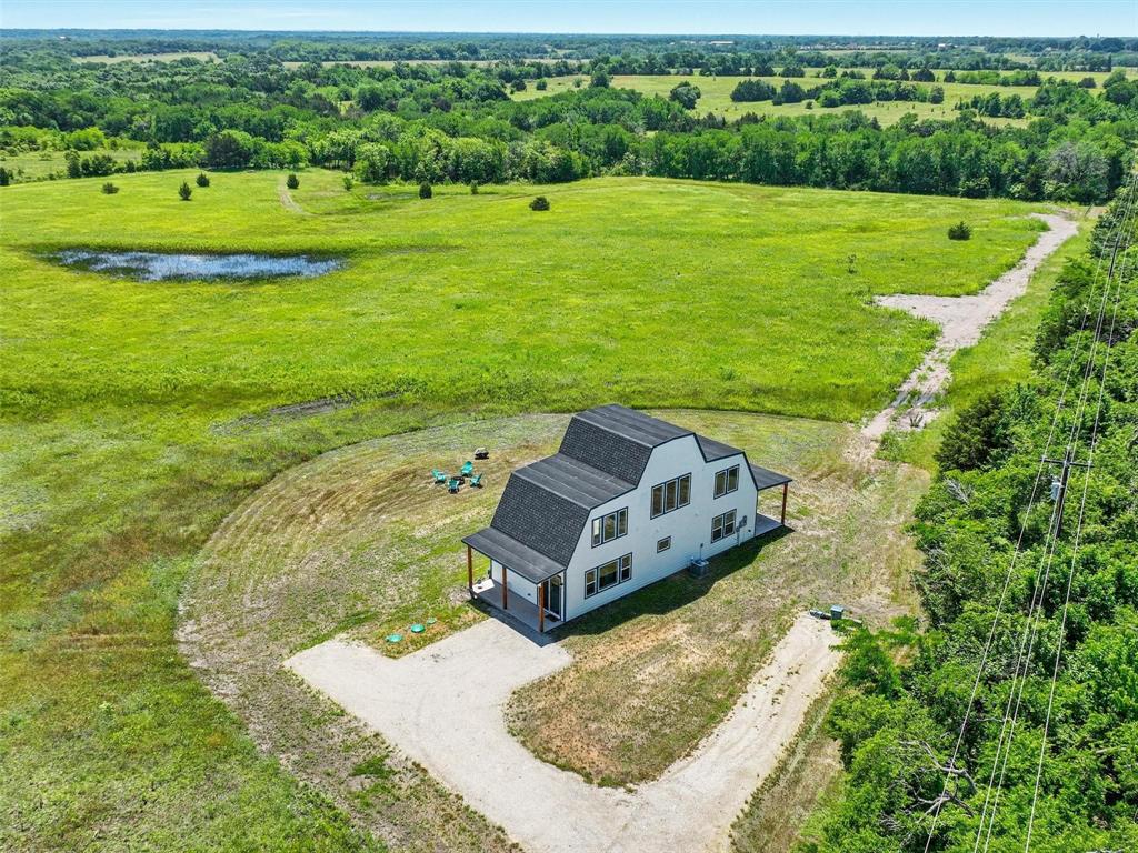 4302 Fm 2862, Unit B Anna, TX 75409 - Photo 11 of 13 a view of a grassy field with trees
