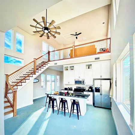a dining room with furniture and a table