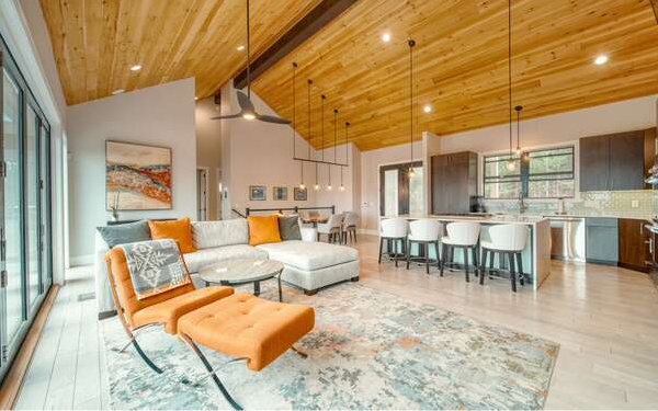 740 Chestnut Mountain Road Blairsville, GA 30512 - Photo 12 of 75 a living room with furniture a flat screen tv and kitchen view