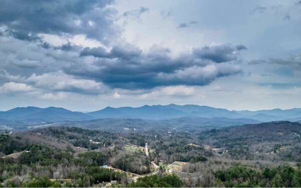 740 Chestnut Mountain Road Blairsville, GA 30512 - Photo 24 of 75 a view of city and mountain in a field