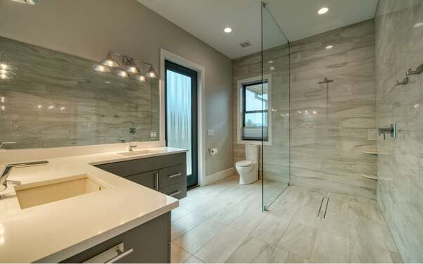 740 Chestnut Mountain Road Blairsville, GA 30512 - Photo 29 of 75 a bathroom with a sink a large mirror and a shower
