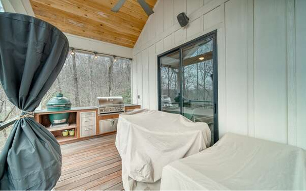 740 Chestnut Mountain Road Blairsville, GA 30512 - Photo 39 of 75 a bedroom with a bed and a large window