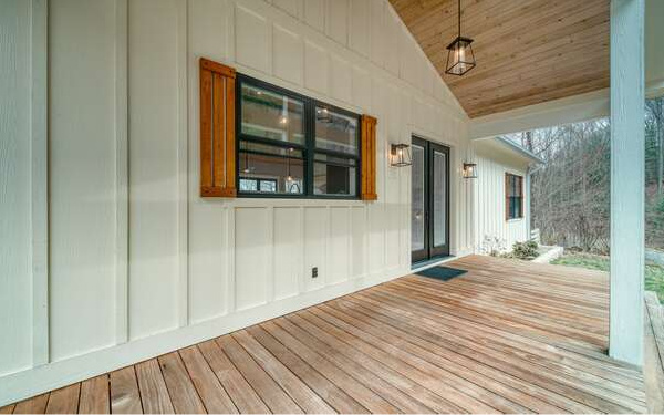 740 Chestnut Mountain Road Blairsville, GA 30512 - Photo 50 of 75 a view of empty room with wooden floor and fan